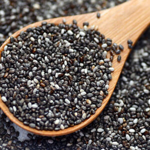 Raw organic black chia seeds, close up image